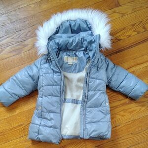 Stylish Light Blue Puffer Jacket with Faux Fur Hood